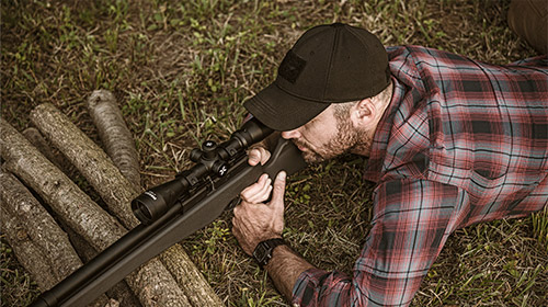 shooter behind the Umarex Origin from the prone position